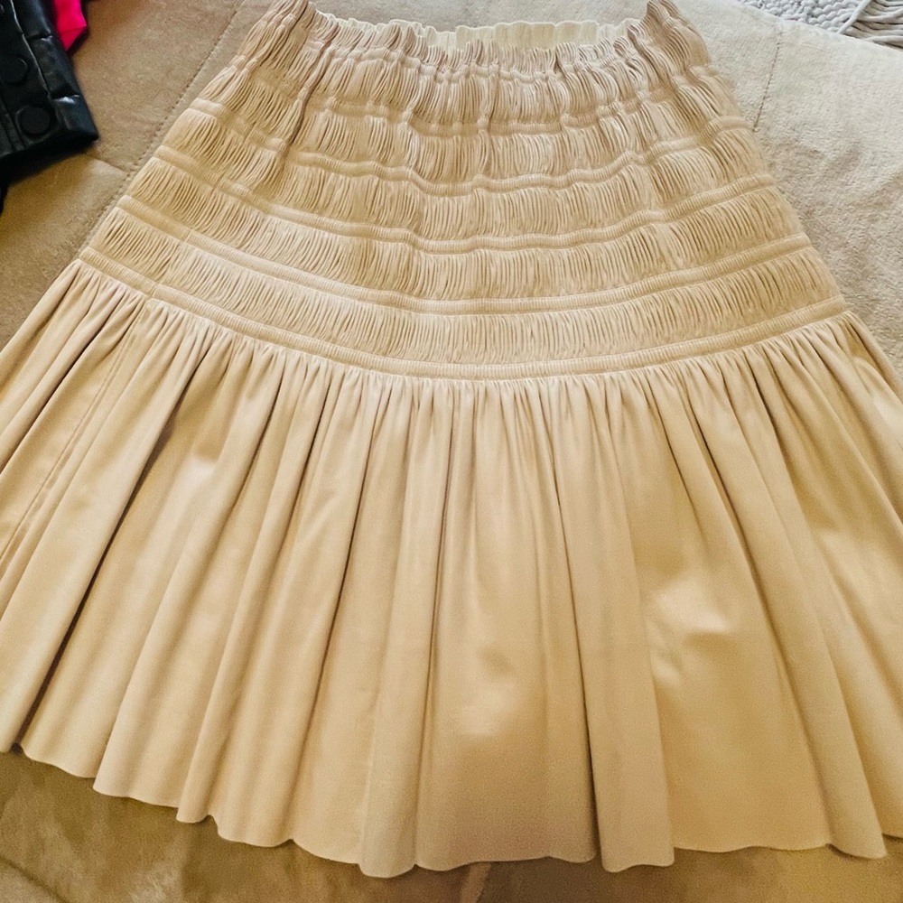 SMOCKED PLEATED LEATHER SKIRT